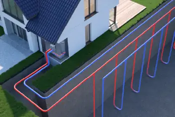 Professional geothermal heat pump installation technician working on ground source system